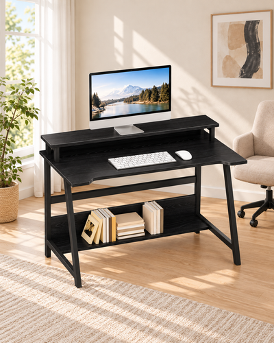 Black compact computer desk with full desk visible in a bright home office